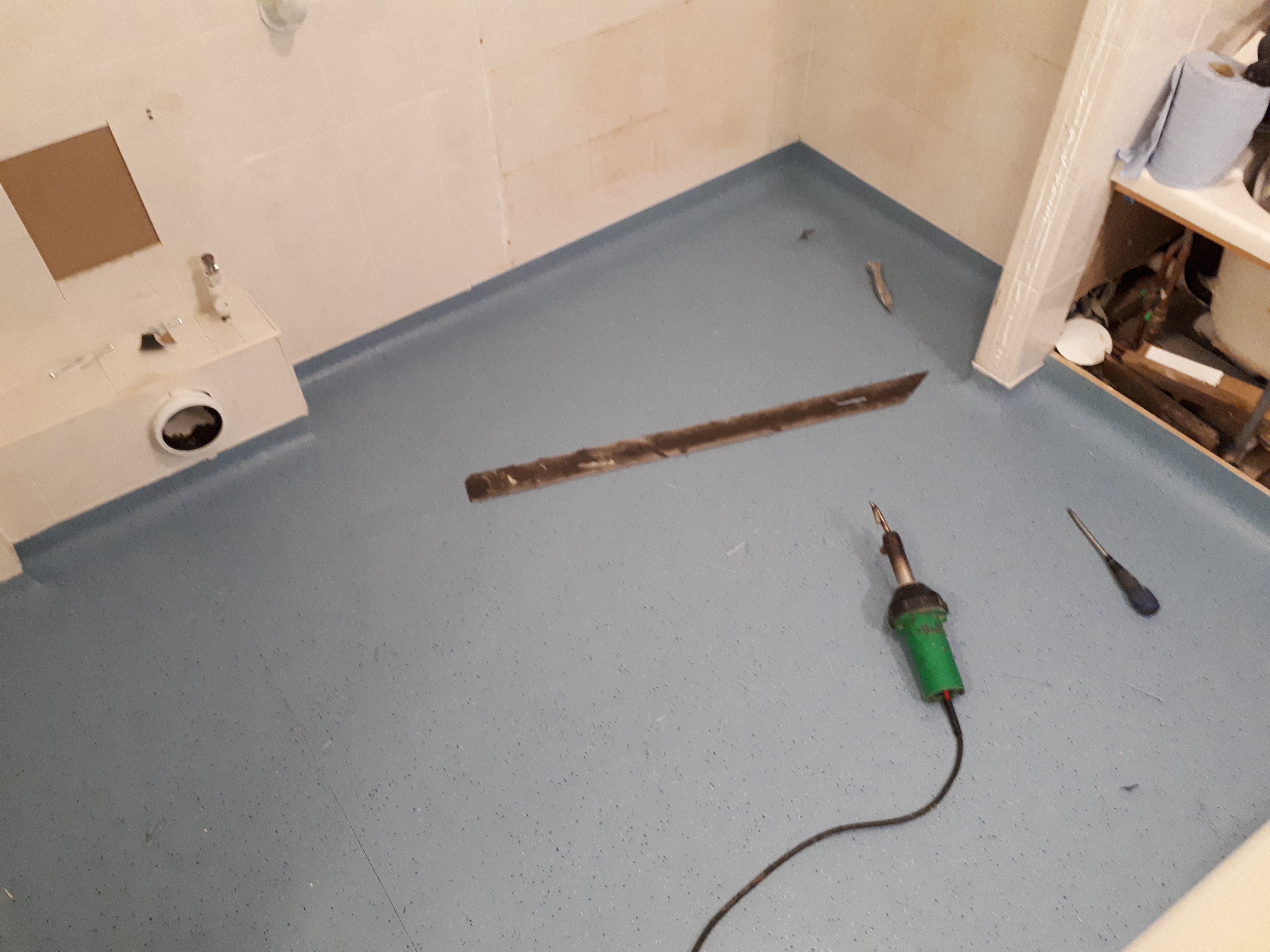 Wet room safety flooring to walk in shower